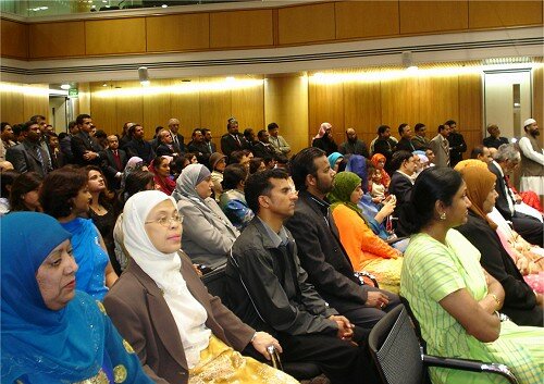 Sister Nasreen Hanif, President of the Islamic Women's Council of New Zealand (left foreground) next to Sister Ungku Maimunah Tahir, Chair of Malay studies Department Victoria University Wellington among other guests.