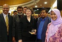 Dr Anwar Ghani (WMA), M. Faruk Khan (President SMA), Prime Minister Helen Clark, Mohammed Jamal (Secretary SMA) and other members of the Wellington Muslim Community.