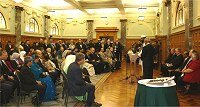 Guests listening to the Recitation of the Holy Qur'an